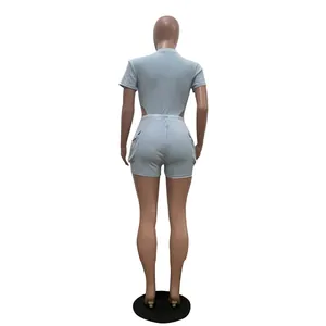 Rear view of a stylish casual light blue washed romper and shorts set for women