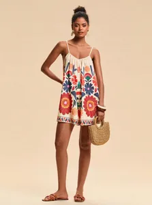 Detailed view of women's summer boho floral print camisole romper with loose fit