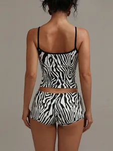 Detailed back view of a stylish black and white zebra print camisole and shorts set.