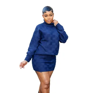 Full body view of women's two-piece navy blue checkered knitted sweater and skirt set