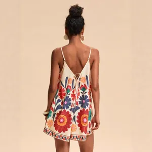 Bohemian floral print romper with spaghetti straps and tie-back for summer vacation