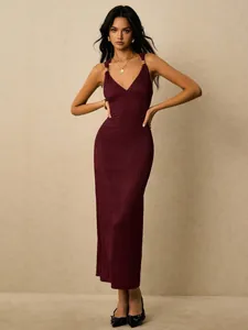 Elegant wine red pleated bodycon midi dress featuring a v-neck and gold strap detail