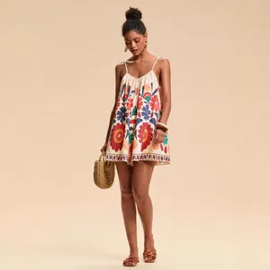 Boho floral spaghetti strap romper jumpsuit for summer resort vacations and leisure.