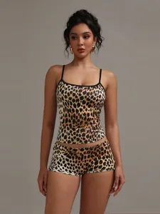 Detailed view of women's leopard print camisole and shorts two-piece loungewear set