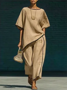 Élégant ensemble deux pièces pour femme avec passepoil contrasté, haut ample et pantalon large