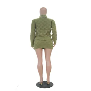 Back view of a casual green checkerboard knit two-piece set with turtleneck and skirt