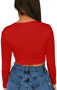 Back view of a red cropped long sleeve T-shirt featuring a slim fit and plain design