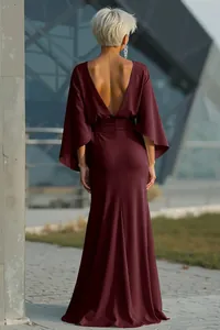 Elegant burgundy maxi dress featuring a deep V open back and pleated waist detail