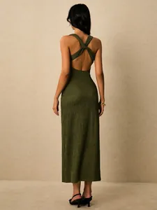 Detail of olive green ribbed midi dress showing backless criss-cross straps design.