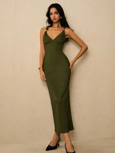 Elegant olive green ribbed midi bodycon dress with v-neckline and gold hardware strap accents