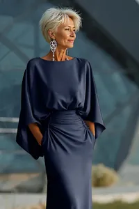 Elegant navy blue pleated dress with batwing sleeves and side pockets for women