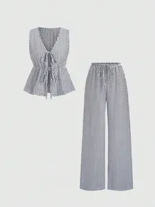 Chic black and white striped two-piece summer set with tie-front vest and wide-leg pants
