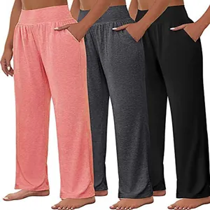 Detail showing the high-waist fit and fabric texture in pink, charcoal, and black