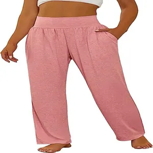Detail of loose wide-leg yoga pants for women in pink with high waist and pockets