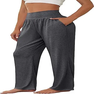 Detailed view of high-waist dark grey wide-leg yoga pants for women