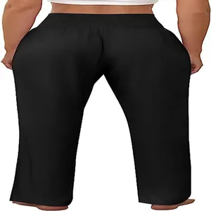 Rear view of comfortable black high-waisted wide-leg yoga pants for women with a loose fit