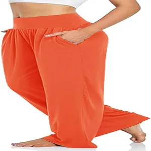 High waisted orange wide leg yoga pants for women featuring a loose fit and side pockets.