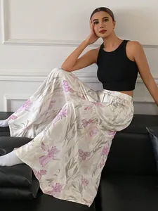 Pantalon large à fleurs fluide à taille haute élégant pour un look d'été chic
