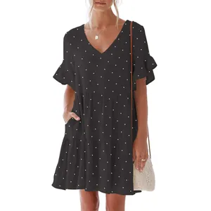 Detailed view of women's black V-neck polka dot dress with ruffle sleeves and pockets