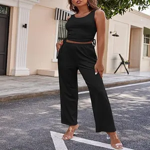Elegante conjunto casual de dos piezas con top corto negro y pantalones de pierna ancha