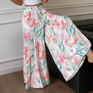 Pantalon élégant à fleurs, taille haute et jambes larges en tissu fluide pour l'été
