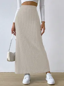 Elegant beige high-waisted ribbed knit maxi skirt for women in a slim fit design