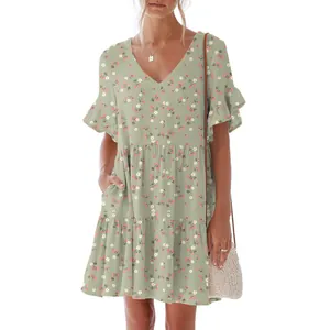 Detailed view of women's sage green floral V-neck dress with ruffle sleeves and pockets