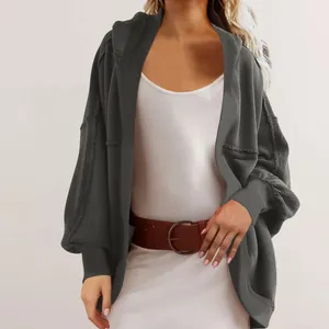 Detail of dark grey oversized hooded cardigan with loose fit