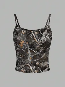 Detailed view of women's camo print camisole featuring adjustable thin straps and leaf pattern