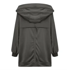Back view of grey oversized hooded jacket with unique seam details and ribbed cuffs
