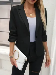 Detailed view of an elegant black slim-fit mid-sleeve blazer with notched lapels and button