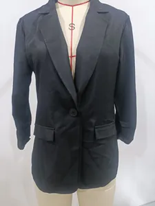 Detailed macro view of an elegant black half sleeve blazer with front button and notched lapels
