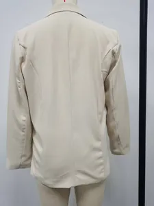 Back view of a classic beige women's casual long sleeve blazer with tailored seams