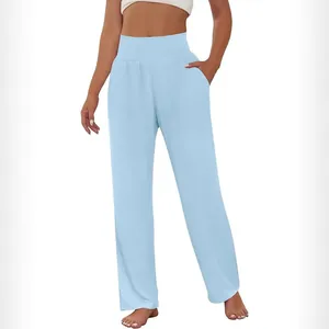 Detail view of women's light blue high-waisted wide-leg yoga pants with side pockets