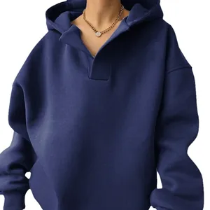 Oversized navy blue hooded sweatshirt with front lapel detail and ribbed cuffs.