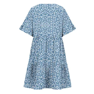 Detailed back view of a blue and white floral summer dress with ruffled short sleeves