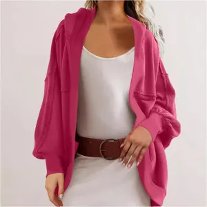 Women's loose pink hooded cardigan jacket with dropped shoulders and raw edge details