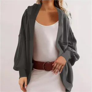 Casual women's oversized dark grey hooded cardigan jacket with textured fabric finish