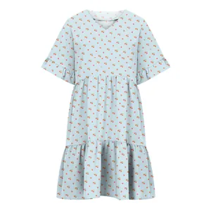 Detailed view of light blue short sleeve dress with red cherry pattern and ruffle V-neck.