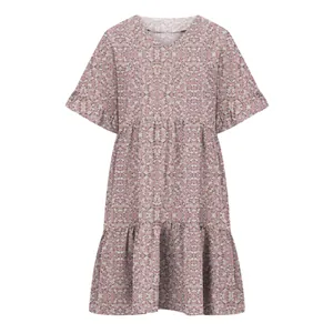 Summer floral dress featuring V-neckline and tiered ruffle sleeve cuffs in pink shade