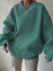 Detail view of high-quality oversized green solid color long sleeve casual sweatshirt for women