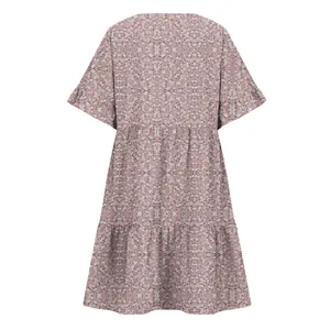 Back view of loose short-sleeved dress with purple floral pattern and tiered hem.