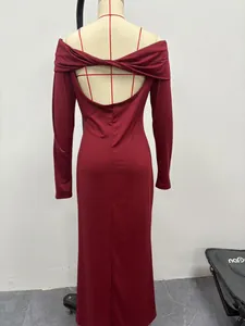 Back view of elegant wine red off-shoulder evening dress showing open back twist detail