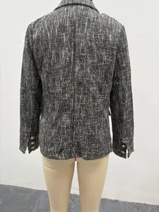 Back view of a grey tweed blazer on a mannequin showing tailored slim fit details.