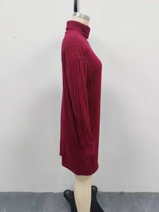 Detailed side view of a wine red ribbed turtleneck long sleeve midi dress for women