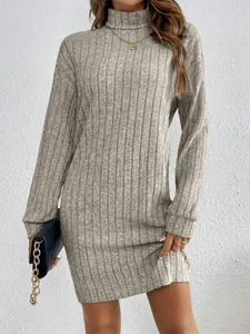 Detailed view showing the ribbed texture and high neck of the long sleeve grey knit dress