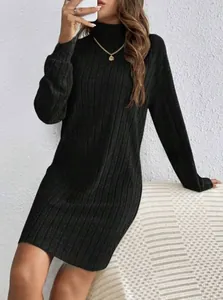 Close-up detail of a black ribbed knit turtleneck dress featuring elegant brushed stripe texture