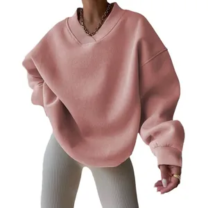 Women's oversized dusty pink sweatshirt with long sleeves and a ribbed V-neckline