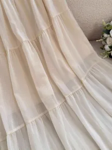 French style white tiered maxi skirt with elegant pleats and soft chiffon fabric
