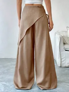 Rear view of brown high-waisted wide-leg pants with asymmetrical wrap design detail